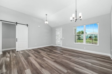 Stunning new construction home in the very desirable 55 Plus on Highlands Ridge Golf Course - North  in Florida - for sale on GolfHomes.com, golf home, golf lot