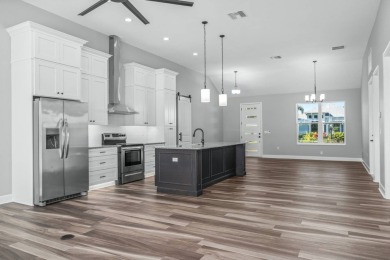 Stunning new construction home in the very desirable 55 Plus on Highlands Ridge Golf Course - North  in Florida - for sale on GolfHomes.com, golf home, golf lot