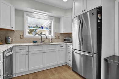 Welcome to low-maintenance living with thoughtful updates and on Inland Greens Golf Course in North Carolina - for sale on GolfHomes.com, golf home, golf lot