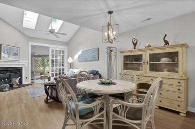 Welcome to low-maintenance living with thoughtful updates and on Inland Greens Golf Course in North Carolina - for sale on GolfHomes.com, golf home, golf lot