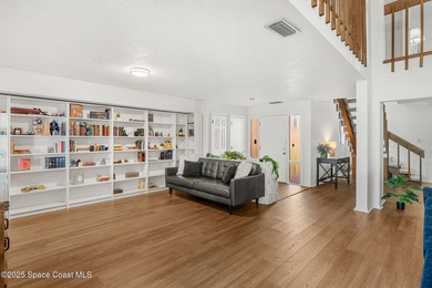 Spectacular lake, golf course, and tree-lined views! A welcoming on Suntree Country Club in Florida - for sale on GolfHomes.com, golf home, golf lot