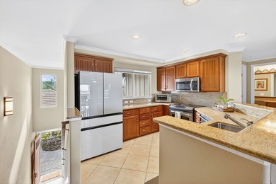 Surrounded by fairways. Framed by sunsets. Designed for both on Mauna Lani Resort Golf Course in Hawaii - for sale on GolfHomes.com, golf home, golf lot