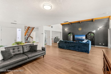 Spectacular lake, golf course, and tree-lined views! A welcoming on Suntree Country Club in Florida - for sale on GolfHomes.com, golf home, golf lot