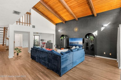 Spectacular lake, golf course, and tree-lined views! A welcoming on Suntree Country Club in Florida - for sale on GolfHomes.com, golf home, golf lot