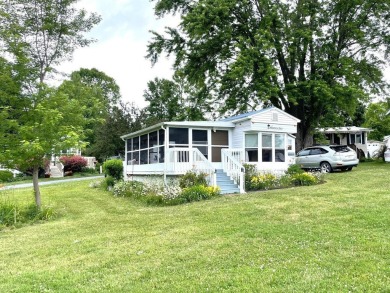 Enjoy summer in Vermont with a cottage at Apple Island Resort on on Apple Island Golf Course At Apple Island Resort in Vermont - for sale on GolfHomes.com, golf home, golf lot