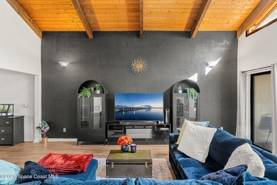 Spectacular lake, golf course, and tree-lined views! A welcoming on Suntree Country Club in Florida - for sale on GolfHomes.com, golf home, golf lot