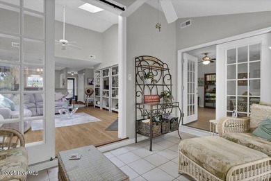 Welcome to low-maintenance living with thoughtful updates and on Inland Greens Golf Course in North Carolina - for sale on GolfHomes.com, golf home, golf lot