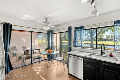 Spectacular lake, golf course, and tree-lined views! A welcoming on Suntree Country Club in Florida - for sale on GolfHomes.com, golf home, golf lot