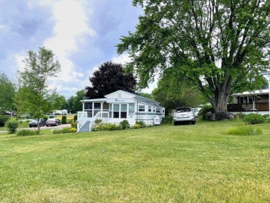 Enjoy summer in Vermont with a cottage at Apple Island Resort on on Apple Island Golf Course At Apple Island Resort in Vermont - for sale on GolfHomes.com, golf home, golf lot