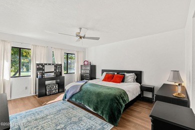 Spectacular lake, golf course, and tree-lined views! A welcoming on Suntree Country Club in Florida - for sale on GolfHomes.com, golf home, golf lot