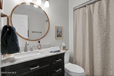 Welcome to low-maintenance living with thoughtful updates and on Inland Greens Golf Course in North Carolina - for sale on GolfHomes.com, golf home, golf lot