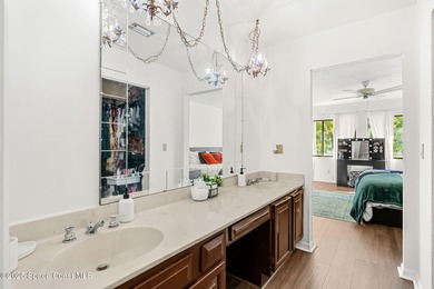 Spectacular lake, golf course, and tree-lined views! A welcoming on Suntree Country Club in Florida - for sale on GolfHomes.com, golf home, golf lot