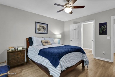 Welcome to low-maintenance living with thoughtful updates and on Inland Greens Golf Course in North Carolina - for sale on GolfHomes.com, golf home, golf lot