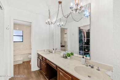 Spectacular lake, golf course, and tree-lined views! A welcoming on Suntree Country Club in Florida - for sale on GolfHomes.com, golf home, golf lot