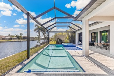 Stunning New Construction Home on Gulf-Access Canal with Canal on Royal Tee Country Club in Florida - for sale on GolfHomes.com, golf home, golf lot