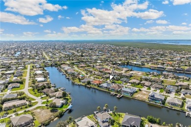 Stunning New Construction Home on Gulf-Access Canal with Canal on Royal Tee Country Club in Florida - for sale on GolfHomes.com, golf home, golf lot