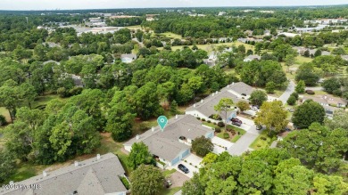 Welcome to low-maintenance living with thoughtful updates and on Inland Greens Golf Course in North Carolina - for sale on GolfHomes.com, golf home, golf lot