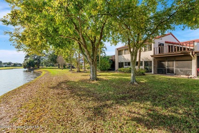 Spectacular lake, golf course, and tree-lined views! A welcoming on Suntree Country Club in Florida - for sale on GolfHomes.com, golf home, golf lot