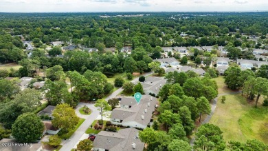 Welcome to low-maintenance living with thoughtful updates and on Inland Greens Golf Course in North Carolina - for sale on GolfHomes.com, golf home, golf lot