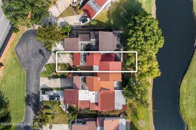 Spectacular lake, golf course, and tree-lined views! A welcoming on Suntree Country Club in Florida - for sale on GolfHomes.com, golf home, golf lot