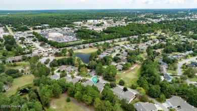 Welcome to low-maintenance living with thoughtful updates and on Inland Greens Golf Course in North Carolina - for sale on GolfHomes.com, golf home, golf lot