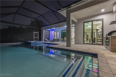 Stunning New Construction Home on Gulf-Access Canal with Canal on Royal Tee Country Club in Florida - for sale on GolfHomes.com, golf home, golf lot