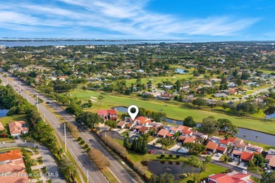 Spectacular lake, golf course, and tree-lined views! A welcoming on Suntree Country Club in Florida - for sale on GolfHomes.com, golf home, golf lot