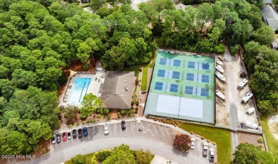 Welcome to low-maintenance living with thoughtful updates and on Inland Greens Golf Course in North Carolina - for sale on GolfHomes.com, golf home, golf lot