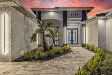 Stunning New Construction Home on Gulf-Access Canal with Canal on Royal Tee Country Club in Florida - for sale on GolfHomes.com, golf home, golf lot