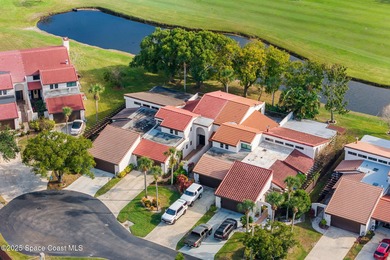 Spectacular lake, golf course, and tree-lined views! A welcoming on Suntree Country Club in Florida - for sale on GolfHomes.com, golf home, golf lot