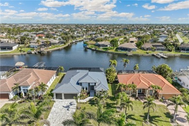 Stunning New Construction Home on Gulf-Access Canal with Canal on Royal Tee Country Club in Florida - for sale on GolfHomes.com, golf home, golf lot