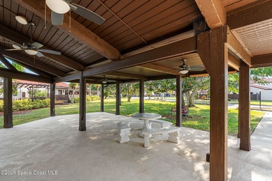 Spectacular lake, golf course, and tree-lined views! A welcoming on Suntree Country Club in Florida - for sale on GolfHomes.com, golf home, golf lot
