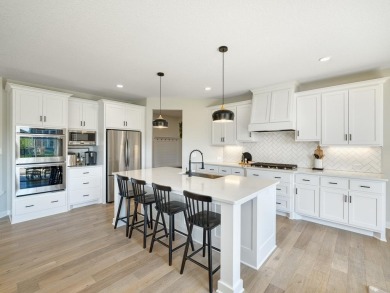 Step into this stunning 2022-built two-story gem that offers on Sundance Golf and Bowl in Minnesota - for sale on GolfHomes.com, golf home, golf lot