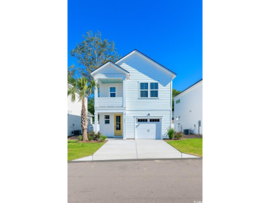 Come enjoy everything Cherry Grove Beach has to offer in the on Tidewater Golf Club and Plantation in South Carolina - for sale on GolfHomes.com, golf home, golf lot