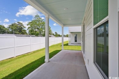 Fall in love with this 4-bedroom, 2.5-bath home in the desirable on Tidewater Golf Club and Plantation in South Carolina - for sale on GolfHomes.com, golf home, golf lot