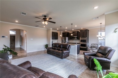 Stunning 5-Bedroom Home with Modern Amenities in Woodway, TX on Twin Rivers Golf Club in Texas - for sale on GolfHomes.com, golf home, golf lot