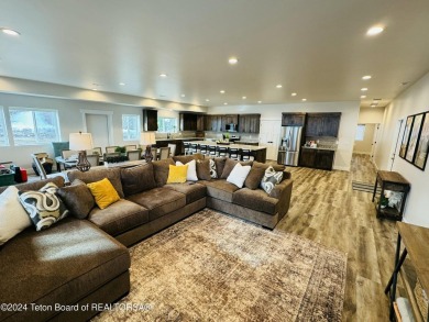 Discover the perfect blend of modern luxury and Wyoming's on Star Valley RV Golf Course in Wyoming - for sale on GolfHomes.com, golf home, golf lot