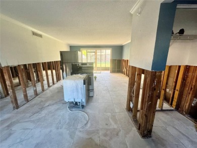 Discover an incredible opportunity in this 1-bedroom, 1-bathroom on East Bay Golf Club in Florida - for sale on GolfHomes.com, golf home, golf lot