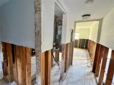 Discover an incredible opportunity in this 1-bedroom, 1-bathroom on East Bay Golf Club in Florida - for sale on GolfHomes.com, golf home, golf lot
