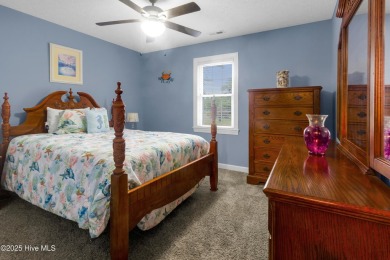 Charming waterview retreat! Welcome to 901 Caracara Drive a on Harbour Point Golf Club in North Carolina - for sale on GolfHomes.com, golf home, golf lot