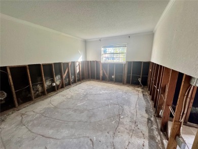 Discover an incredible opportunity in this 1-bedroom, 1-bathroom on East Bay Golf Club in Florida - for sale on GolfHomes.com, golf home, golf lot