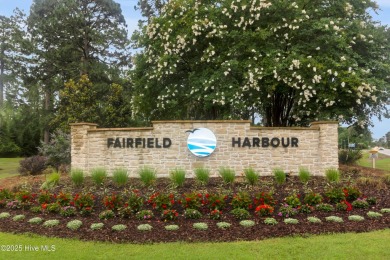 Charming waterview retreat! Welcome to 901 Caracara Drive a on Harbour Point Golf Club in North Carolina - for sale on GolfHomes.com, golf home, golf lot