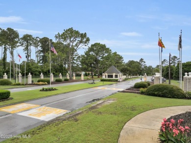 Charming waterview retreat! Welcome to 901 Caracara Drive a on Harbour Point Golf Club in North Carolina - for sale on GolfHomes.com, golf home, golf lot
