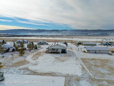 Discover the perfect blend of modern luxury and Wyoming's on Star Valley RV Golf Course in Wyoming - for sale on GolfHomes.com, golf home, golf lot