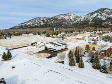 Discover the perfect blend of modern luxury and Wyoming's on Star Valley RV Golf Course in Wyoming - for sale on GolfHomes.com, golf home, golf lot