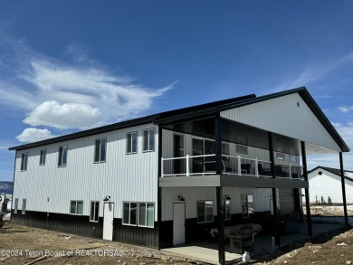 Discover the perfect blend of modern luxury and Wyoming's on Star Valley RV Golf Course in Wyoming - for sale on GolfHomes.com, golf home, golf lot