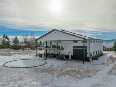 Discover the perfect blend of modern luxury and Wyoming's on Star Valley RV Golf Course in Wyoming - for sale on GolfHomes.com, golf home, golf lot