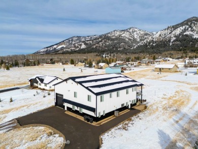 Discover the perfect blend of modern luxury and Wyoming's on Star Valley RV Golf Course in Wyoming - for sale on GolfHomes.com, golf home, golf lot