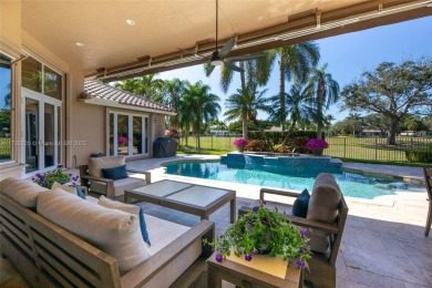 Discover this exquisite 4-bed 3.5-bath w/office & den pool home on Weston Hills Country Club in Florida - for sale on GolfHomes.com, golf home, golf lot