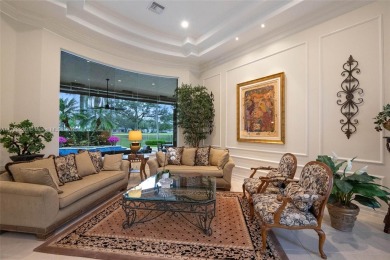 Discover this exquisite 4-bed 3.5-bath w/office & den pool home on Weston Hills Country Club in Florida - for sale on GolfHomes.com, golf home, golf lot